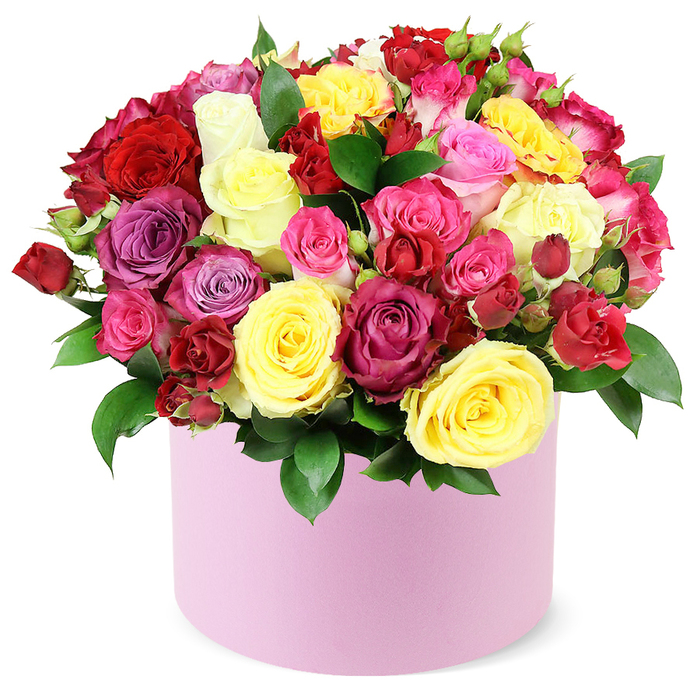 A lavish, multi-coloured bouquet of fresh roses, elegantly presented in a round, soft pastel pink gift box, stands out against a crisp white backdrop. The arrangement forms a dense, generous cluster, dozens of roses at varying stages of bloom-some fully opened with satin-like petals, others still curling into buds-creating a sumptuous texture and a domed silhouette that brims with life. The palette balance is bold yet harmonious: crimson red, sunny yellow, fuchsia, pale pink, magenta, lavender, and creamy white weave together in a painterly gradient. Deep green leaves frame the blooms, peeking between petals to give a sense of garden freshness. The pink box itself bears a matte finish, its rounded shape echoing the curves of the roses and elevating the bouquet to a modern luxury statement. The entire presentation-box, stems, and blossoms-feels crafted with care for a Stanmore doorstep, bringing a touch of boutique glamour to NW London. This piece speaks to celebrations of every kind-anniversaries, birthdays, or simply the joy of a thoughtful surprise. The arrangement conveys generosity and refined taste, ideal for a refined home display or as the centrepiece for a special dinner. It can be delivered with same-day service to Stanmore and nearby NW London neighbourhoods, and I, as the local florist, am happy to tailor the design to suit your message, whether you want a bold, statement-making gift or a more understated, intimate gesture.