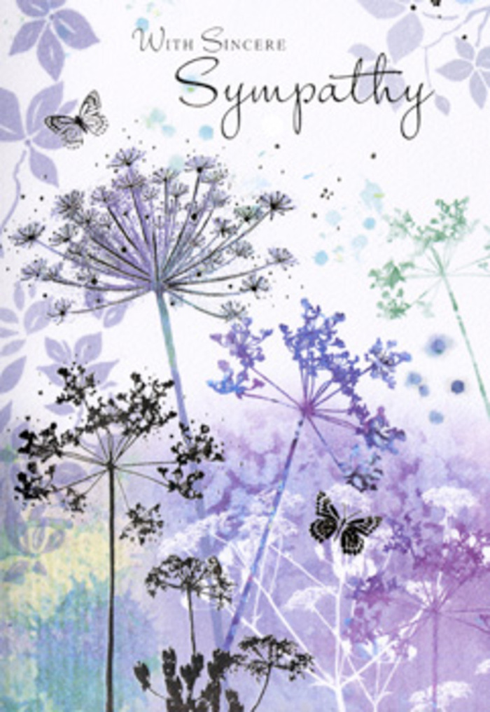 This sympathy card's artwork has the tranquil, contemplative quality of a quiet morning walk near Stanmore Country Park, when the air is cool and still. Slender wildflower stems rise in elegant arcs, each topped with an umbel of tiny, clustered blooms that resemble filigree lace. The florals are rendered in a blend of soft violets, powdery blues, and muted lavender, touched with hints of gentle sage and pale grey-green. Some blossoms stand in sharper focus, while others fade subtly into the background, creating depth and the sense of a whole meadow beyond what is visible on the card. The background itself is a wash of violet and blue that blurs like mist over distant fields, with no hard lines, only soft transitions and cloud-like patches where the pigment has pooled. Floating delicately among the flowers, a pair of butterflies brings a suggestion of movement and hope, their wings lightly textured with translucent touches of colour. The light in the scene feels diffused, as though filtered through a thin veil of cloud, adding to the mood of gentleness and reflection. As experienced florists serving the Stanmore community, we often see how quiet, nature-inspired designs like this can resonate deeply with families facing loss. The card feels like an invitation to pause and remember, to honour a life with the same care and subtlety expressed in a well-chosen sympathy bouquet. Its artistry offers comfort not by distraction, but by mirroring the quiet endurance found in the natural world.