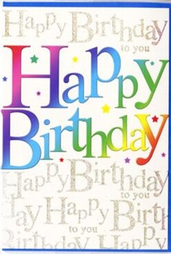 In the image, a colourful birthday card stands upright, its design brimming with the kind of cheerful charm that suits a celebration in Stanmore's quiet, leafy streets. The central focus is the phrase "Happy Birthday," displayed in large, soft-edged letters that sweep across the front in a continuous rainbow of colour. The gradient moves gracefully from deep crimson and berry tones through shades of plum and twilight blue, then into aquatic teal, grassy green, and sunny yellow, as if gently echoing the changing tones of a sky over Stanmore Common. The letters have a smooth, semi-gloss finish that gives them a slightly raised, tactile appearance, suggesting they would feel satisfying to trace with a fingertip. Dotted around the main text are tiny star motifs and delicate specks of colour, reminiscent of confetti scattered over a table laid out for cake and candles. Behind this vivid typographic display, the background remains light yet richly detailed, filled with repeated lines of "Happy Birthday to you" in fine, gold cursive writing. The script curves and loops elegantly across the card, shimmering with a faint metallic glow that calls to mind the gentle sparkle of gift wrap or candlelight. This golden layer stays soft and understated, ensuring the bold rainbow letters remain the star of the design, while still adding a feeling of refinement and care. The overall effect is festive without being overwhelming, making it a perfect partner to a bright birthday bouquet ordered from a local Stanmore florist and delivered to a friend's home near the Broadway, bringing colour, warmth, and heartfelt wishes in one thoughtful gesture.