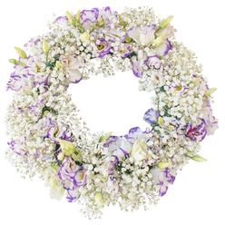 Against a clean, luminous white background, a beautifully composed circular wreath appears almost to float, its colours and textures captured in calm detail. The structure is densely woven with fine sprays of Baby's Breath, their innumerable tiny white blossoms clustering together into a plush, cloud-like ring. The soft, airy quality of the Gypsophila evokes gentle morning light filtering through trees along the quiet residential streets of Stanmore. Nestled throughout this snowy base are generous Lisianthus blooms, carefully placed to create a balanced rhythm around the circle. Each Lisianthus flower features layered, ruffled petals in creamy white, with delicate violet and lavender edging that looks softly hand-painted. Some blossoms are fully open, revealing darker, more shaded centers that add points of focus and depth; others remain in bud, their pale green casings tipped with hints of white and lilac, suggesting blooms yet to unfold. The overall colour palette is restrained and soothing, confined to whites, creams, soft greens, and purples, with no harsh tones to disturb the quiet mood. The open center of the wreath is clearly defined, reinforcing the classic ring shape that is often associated with eternity, remembrance, and unbroken love. Without ribbons or additional adornments, the emphasis remains on the purity and grace of the fresh flowers themselves. This style of arrangement is often selected in Stanmore as a sensitive tribute for funerals, memorials, and crematorium services, offering a gentle floral message of sympathy and support that complements both traditional and contemporary farewells.
