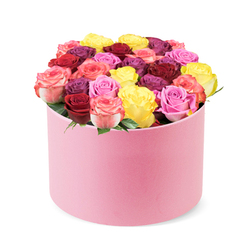 Picture this: a round soft-pink hat box that feels like a whispered secret, resting on a stark white backdrop. The box's velvet-like surface invites a touch, and from its crown pours a garden of roses-dozens, densely packed, each bloom cradled to form a continuous dome of colour. The palette dances: bright sunny yellows glow beside passionate crimsons and velvety magentas, with soft blush pinks and cream-tipped bi-colors weaving through the tapestry. The roses are pristine, the petals curling in perfect satin curves, suggesting they were plucked at peak morning freshness. In this modern, couture arrangement, the greens are kept to a minimum, allowing the blossoms to take centre stage, like a fashion-forward bouquet for a stylish Stanmore home. The presentation feels contemporary yet timeless, suitable for birthdays, anniversaries, or romantic gestures that deserve a little luxury. The scent-gentle, rose-forward, with a whisper of citrus and fresh greenery-invites the senses even before you see the blooms fully. The gift radiates confidence and care, a product of skilled floristry and thoughtful design. In Stanmore, a bouquet like this would travel with care to households along The Ridgeway, Stanmore High Street, or near Stanmore Station, available for same-day delivery across the area. It speaks to a customer who values craftsmanship and freshness, and to a florist who understands how a single box can transform a moment into a memory. Whether given to celebrate a milestone or to brighten a gray day, this arrangement is a promise of joy, wrapped in pink.