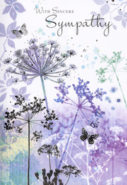 The illustration inside this sympathy card unfolds like a soft landscape, reminiscent of the gentle, open skies that seem to hover above Stanmore's quieter roads at dusk. A cluster of umbelliferous wildflowers rises from the base of the design, their stems long and slender, drawn in quiet graphite strokes that widen just enough to hold feathery heads of blossom. The flowers themselves are tinted with watercolour washes of violet, lilac, and dusky blue, blended with cool silvery greens that give depth without ever becoming heavy. Around them, the background blooms with a veil of diluted purples and blue-greys, the colours bleeding into one another as if touched by mist, leaving soft, cloud-like shapes that frame the stems. Within this tender scene, lightly sketched butterflies drift between the blooms, their wings almost sheer, carrying only a whisper of colour. They seem to hover in mid-thought, embodying remembrance, transformation, and the quiet support that often sits just beneath the surface of grief. The entire design feels hushed, like a room where voices automatically soften out of respect. There's a sense of texture too: you can almost feel the grain of the paper and the velvety touch of the watercolour. For families in Stanmore looking to express sympathy with dignity and care, this card offers an image that pairs beautifully with a thoughtful floral arrangement. Its muted hues and calm composition create a gentle space for reflection, allowing the artwork to hold the weight of your sentiments without overwhelming the recipient.