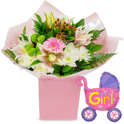 This photograph captures a tender new baby girl gift set, styled against a pristine white background that lets every pastel hue and glossy surface stand out, much like a carefully arranged present waiting on a kitchen table in Stanmore. At the centre is a neat, square light-pink gift box, its subtle colour harmonising with the blossoms it cradles. Emerging from this box, a full bouquet rises and spreads, giving the impression of softness and abundance. A bright pink gerbera daisy commands attention in the middle, its circular form and layered petals radiating simple, heartfelt joy. Around it, clusters of white chrysanthemums with finely textured petals build a cushiony base, while alstroemeria lilies weave through the design, their long petals marked with soft pink and white speckles that add a slightly exotic grace. Creamy yellow lily buds extend gently above the main cluster, still closed, like a quiet promise of blooms yet to open and memories yet to be made with the new arrival. Lime-green button flowers introduce a fresh, zesty note, contrasting beautifully with the dark, glossy greenery and lacy fern fronds that frame the arrangement. Scattered among the foliage, deep red hypericum berries bring warm, berry-toned accents that keep the palette rich and inviting. The bouquet is wrapped in layers of blush-pink tissue paper and clear cellophane, each fold neat and considered, as if arranged by careful hands at Flowers Stanmore before a same-day delivery. To the right of the flowers hovers a metallic foil balloon in the playful shape of a baby pram. Its main body glitters in bright pink, while a purple hood and purple wheels with multi-coloured spokes add lively touches. Bold yellow and green lettering spells out "It's a Girl!" along the side, accented with dainty heart motifs. The overall impression is one of joy, tenderness, and celebration, perfect for marking a baby shower, hospital discharge, or first day at home in Stanmore's calm suburban streets.