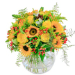 Evoking the radiant spirit of Stanmore in late summer, this golden-hued bouquet is a celebration of warmth, vitality, and heartfelt connection. Large sunflowers with chocolate-brown centres form the centrepiece, their luminous yellow petals sending rays of cheer reminiscent of sun-dappled afternoons near Canons Park. Intertwined, bright yellow roses open into soft, creamy spirals, each bloom holding a promise of joy that suits milestone moments and simple acts of kindness alike. Around them, pops of vivid orange blooms and clusters of glossy red berries add playful surprises, their vibrant contrast echoing the diversity of gardens along Stanmore's suburban streets. Wispy greenery, especially feather-like ferns, extends from the bouquet, their subtle movement bringing lively energy, much like a gentle breeze rustling through the local parks. The clear, rounded glass vase creates a serene foundation, letting stems cross in a relaxed yet artful manner. Fragrances of green and lightly sweet floral notes drift upward, conjuring the scents of freshly tended gardens. Created by Flowers Stanmore, this arrangement is intended to uplift-perfect for birthdays, meaningful thank-yous, or simply bringing a sunbeam of Stanmore's charm indoors.