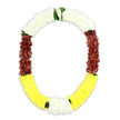 The photograph presents a traditional U-shaped funeral garland, artfully arranged so it appears to float against a bright white background, giving a clear view of every petal and leaf. Along the top curve, tightly bunched white flowers-similar to tiny chrysanthemums or jasmine-form a thick, cushiony band that feels serene and pure, as if offering a gentle blessing. The garland then transitions down each side into broad expanses of deep maroon-red blooms, their velvety petals overlapping to create a rich, textured surface that conveys dignity and solemn respect, fitting for a farewell in Stanmore. At the lowest part of the oval, the palette lightens into a wide band of bright yellow flowers, introducing an understated sense of warmth and remembrance, like a quiet shaft of sunlight through a chapel window. Scattered between these colour segments are delicate clusters of vivid green foliage, added precisely at the points where white meets maroon and where maroon shifts into yellow, providing contrast and a natural, flowing rhythm. The floral work is dense and carefully measured, with no gaps in the surface, suggesting that an experienced florist has threaded or fixed each bloom to achieve both fullness and graceful drape. This style of garland, often used in South Asian and Southeast Asian traditions, would be suitable for adorning a photograph, surrounding a memorial display, or enhancing a religious service in Stanmore. With its balanced combination of white peace, maroon gravity, yellow hope, and fresh green life, the piece visually expresses comfort, honour, and the enduring bonds of family and faith.