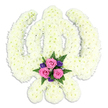 A beautifully crafted Sikh Khanda floral tribute is shown in front of a clear white backdrop, the whole emblem realised through a lush covering of fresh white chrysanthemums. The central double-edged sword is cleanly defined, rising vertically and framed by the unbroken circle of the chakkar and the outstretched arcs of the crossed kirpans. Each chrysanthemum head nestles tightly against the next, creating a soft, plush surface that seems almost quilted with petals. The uniform white tones suggest purity and peace, reminiscent of quiet moments in Stanmore's green spaces or the stillness of a family gathering before a funeral service. At the very base of the Khanda, nestled where the two swords meet, a carefully placed accent bouquet introduces colour and personal sentiment. Three pink roses are arranged close together, their petals opening into layered spirals that feel both gentle and strong. They are surrounded by small, deep purple blooms and a frame of dark green leaves and feathery fern, whose shapes and textures contrast with the rounded chrysanthemums above. The lighting is soft and evenly spread, with only a delicate shadow beneath the arrangement to hint at its three-dimensional presence. The overall impression is one of quiet strength, faith, and affection, making this an especially fitting tribute for Sikh funerals and memorial services in Stanmore and the surrounding area. It is the kind of design that reflects both devotion to religious tradition and the loving farewell of family and friends, thoughtfully composed by florists who understand the significance of the Khanda symbol.