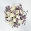 Serene and elegant, this bouquet from Stanmore gathers creamy white roses and clouds of lavender statice into a harmonious composition. Each rose displays unfolding, velvety petals, their glowing centres radiating affection, while the statice curls and branches delicately, evoking the peaceful sweep of the gardens at Stanmore Park. Beneath natural daylight, the bouquet's palette remains pure and hopeful, the contrast of soft blooms and textured lavender creating a quietly enchanting effect. The fragrance is gentle and powdery, reminiscent of spring air and blossoming hedgerows. Ideal for a wedding, anniversary along Uxbridge Road, or any heartfelt celebration in this leafy borough, the arrangement's mood is calming and lovingly crafted. As a dedicated Stanmore florist, I see in this bouquet a promise of sincerity-carefully designed to bring joy and comfort, echoing the tranquil beauty of the local community.