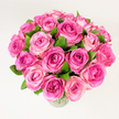 A lush, hand-gathered bouquet of roughly two dozen pink roses, captured from a slightly elevated angle so the rounded, generous dome of blooms fills the frame. Each rose is open or nearly so, petals layered in velvety spirals that graduate from a deep fuchsia at the heart to softer rosy and blush tones at the edges, creating a natural ombré effect that reads like a sunrise in petal form. Dark, glossy green leaves are tucked between the heads, their cool tones sharpening the warmth of the pinks and lending the composition a fresh, organic rhythm. The stems sit in a simple clear glass vase whose faint rim shows at the bottom of the image, and the whole display rests against a clean, evenly lit white background that highlights texture, shadow, and the subtle sheen on each petal. Soft diffuse light reveals the powdery scent one imagines-delicate and familiar-while the dense packing of blooms communicates abundance and celebration. As a Stanmore florist might say, this arrangement is equally at home on an anniversary table in a Chapel Lane flat or as a heartfelt delivery to someone living near Stanmore Broadway, carrying an air of romance and quiet joy. The bouquet's craftsmanship suggests careful hand-tying and attention to bloom placement so each rose breathes within the mass. This is a classic, elegant statement piece-romantic, generous, and tactile-ideal for moments of gratitude, birthdays, Valentine's gestures, or as a comforting, beautiful presence in a sunlit living room or on a special dining table.