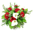 A romantic, high-impact bouquet of red roses and white calla lilies is captured against an immaculate white background, as if poised on a polished table in a Stanmore townhouse just before a celebration begins. The flowers are arranged in a rounded, full shape, with the deepest, richest red roses forming the main body of the design. Each rose is lush and velvety, petals layered in classic spirals that suggest both intimacy and grandeur, the kind of bloom chosen for significant moments and heartfelt declarations. Standing among them, tall white calla lilies lend a modern, sculptural elegance. Their elongated trumpets arc gracefully, enclosing slender yellow spadices that appear to softly glow within the pure white petals, adding a quiet, luminous centre to the bouquet. The entire arrangement is cradled in abundant greenery. Slender stems of eucalyptus, carrying small, rounded silvery-green leaves, weave through the composition and peek out at its edges, creating a gentle, airy halo around the bolder blooms. Larger, deep-green leaves tuck beneath and between the flowers, building volume and structure much like the layered planting in the gardens off Stanmore Broadway. The bouquet is supported by a clear glass vase, only the ribbed base of which is visible beneath the leafy canopy at the bottom of the image. Soft, even light enhances the vivid contrast between crimson, white, and green, while the blank background ensures the viewer's focus stays entirely on the flowers. This arrangement feels ideal for anniversaries, proposals, or elegant dinner parties in Stanmore, capturing the refined touch and emotional sensitivity of a florist who crafts each piece to speak clearly of love and celebration.