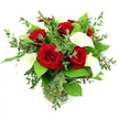 A striking yet refined arrangement of deep red roses and pristine white calla lilies is gathered in a clear glass vase, set before a pure white background that highlights the bouquet's shape and colour. At its core, several red roses bloom fully open, each one rich with velvety petals swirling in layers of intense crimson, creating an immediate impression of passion and enduring affection. Rising elegantly among them, trumpet-shaped calla lilies in creamy white stretch upward, their smooth petals curving like polished porcelain and revealing a slender yellow spadix at the centre, adding a hint of warmth and sophistication. Encircling these central flowers, an abundance of greenery creates a pleasing, rounded composition: soft, lightly drooping stems of eucalyptus with rounded, silvery-green leaves add a breathable, airy texture, while broader, glossy dark green leaves furnish the bouquet with structure and a deeply verdant base. The cylindrical glass vase reveals the green stems gathered neatly in crystal-clear water, with a subtle ribbed detail at the lower edge of the vase's base giving a quiet touch of craftsmanship. Even, bright lighting bathes the entire arrangement, intensifying the contrast between red, white, and green while preserving a calm and inviting atmosphere. The bouquet feels ideal for a romantic dinner in a Stanmore apartment near the station, or as a thoughtful floral delivery to a family home close to Stanmore Golf Course, bringing a sense of quiet celebration and sincerity to anniversaries, Valentine's Day, or any treasured moment that calls for a beautifully balanced expression of love.