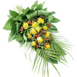 An elegant sympathy spray of yellow roses and red berries is captured against a pristine white background, its teardrop shape flowing diagonally across the image. The main focus is a generous cluster of yellow roses, approximately fifteen to twenty in number, carefully arranged so that each bloom has space to breathe. Some roses are still in tight bud, with smooth, rounded forms, while others are open, their velvety petals spiralling outward in soft, golden layers. Interspersed among these blooms are clusters of small, round red berries, likely Hypericum, their deep, jewel-toned red adding a gentle richness that balances the brightness of the yellow. Surrounding the flowers is a full collar of greenery. At the top left, where the stems are firmly bound together, broad dark green leaves are layered and sometimes folded, creating a strong, sculpted base that gives the design structure and presence. From this anchor point, the foliage extends down towards the lower right in a more relaxed form, transforming into long, palm-like fronds whose fine, pointed leaflets arc outward gracefully, like the gentle curves of paths winding through local parks near Stanmore. The light is clear and even, with minimal shadow, so the textures of each element-the sheen on the leaves, the smooth surface of the berries, the plush petals of the roses-are easy to discern. The mood of the piece is quietly comforting and dignified, a fitting arrangement for use as funeral flowers or a memorial tribute in Stanmore, where families may be seeking a floral expression of sympathy that combines warmth, respect, and a touch of uplifting colour.