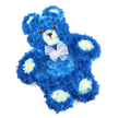 Against a clean white backdrop, a meticulously designed floral teddy bear appears serene and gently reassuring, its form artfully composed from fresh blooms in shades of blue and cream. The body is predominantly a rich royal blue, built from compact clusters of small flowers that sit so closely together they suggest the dense, velvety nap of plush fabric. This floral fur covers the entire bear, from the rounded head and softly curved ears to the broad tummy and four neatly finished paws. Lighter cream and pale yellow blossoms highlight the bear's facial features and paw pads: they trace the inner circles of the ears, define the slightly protruding muzzle, and form the ovals on each paw, giving dimension and warmth against the deep blue. The face is expressive yet gentle, with two round, dark eyes that catch the light, a small black triangular nose, and a delicate curved line that shapes a subtle smile. Around the neck, a sheer white organza-style bow is tied into a neat bow, its ruffled edges and translucent texture adding a hint of ceremony and softness. The bear is arranged to lie flat but angled slightly, which adds depth and allows the viewer to appreciate the craftsmanship of each petal placement. As a local florist in Stanmore, I often see this blue teddy bear tribute ordered for children's memorials or as a comforting floral piece delivered to homes near Bentley Priory and the surrounding quiet streets. The royal blue colour conveys calm and remembrance, while the teddy bear figure recalls bedtime comfort, gentle guardianship, and enduring affection. It serves as a thoughtful, tender way to express sympathy when words feel inadequate.